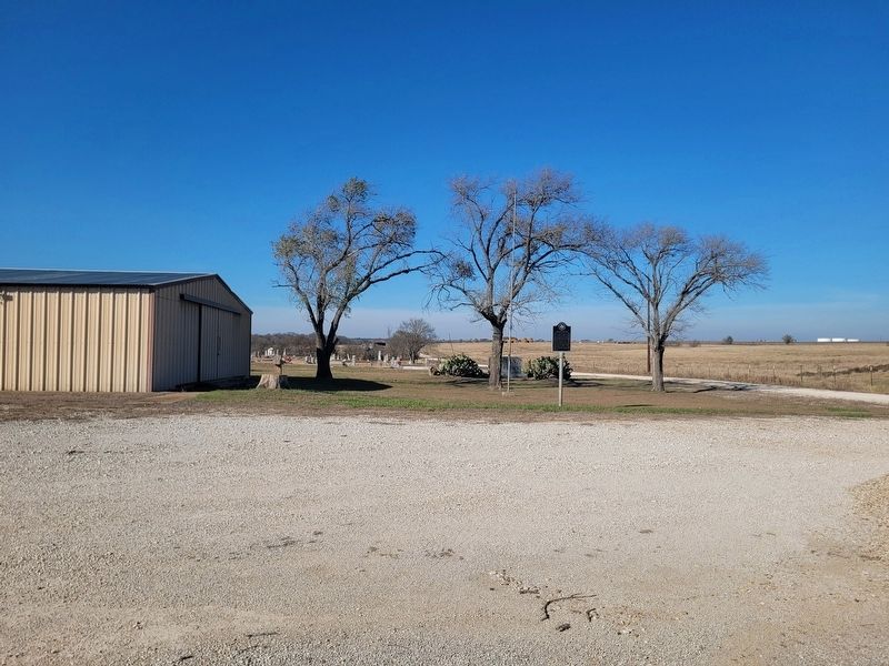 The view of the Marker from the cemetery parking area. Click for full size. The view of the Marker from the cemetery parking area image. Click for full size.