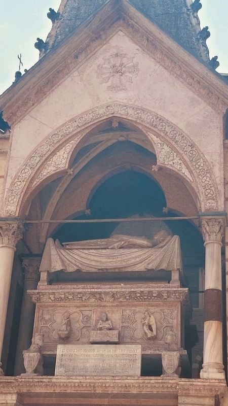 The sarcophagus and effigy of Cangrande I over the front entrance to the church. Click for full size. The sarcophagus and effigy of Cangrande I over the front entrance to the church image. Click for full size.