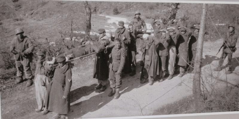Marker detail: 10th Mountain troopers escorting a group of German prisoners image. Click for full size.