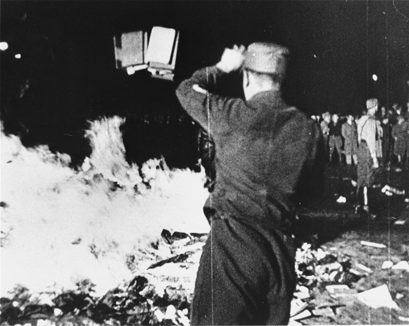 Burning books image. Click for full size.
