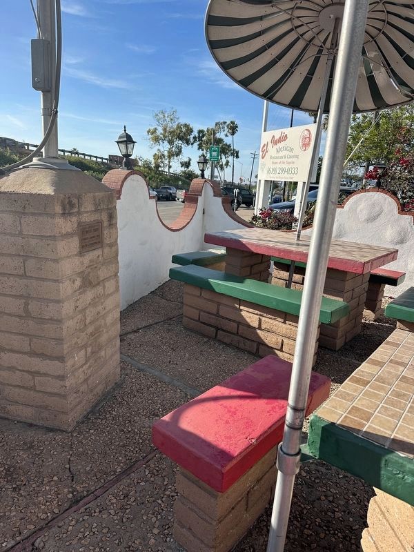 El Indio Shop marker located on the tan brick portion of the patio wall image. Click for full size.