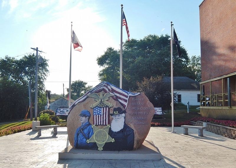 What Cheer Freedom Rock Veterans Memorial Plaza <br>(<i>east side</i>). Click for full size. What Cheer Freedom Rock Veterans Memorial Plaza <br>(<i>east side</i>) image. Click for full size.