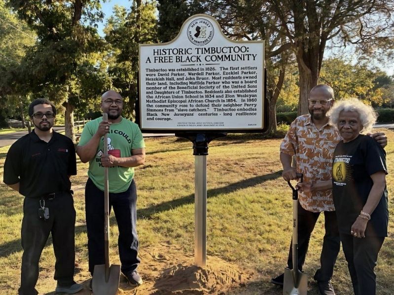 Aaron-Jamal Weston (left), Mark Weston (center), Guy Weston (right) and Mary Weston image. Click for full size.