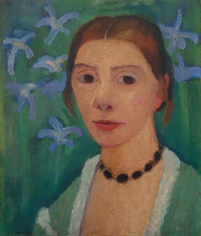 Self-portrait with blue irises image. Click for full size.