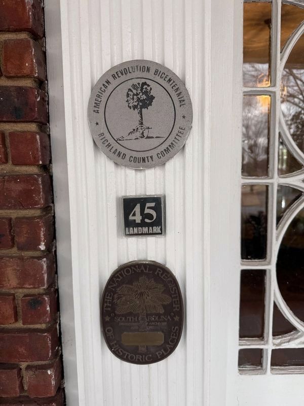 Several plaques on the house image. Click for full size.