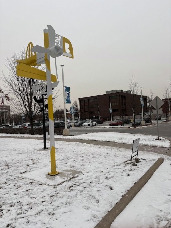 Bessie Coleman sculpture and sign image. Click for full size.