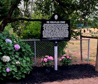 The Wheatland Ferry Marker flower garden. image. Click for full size.