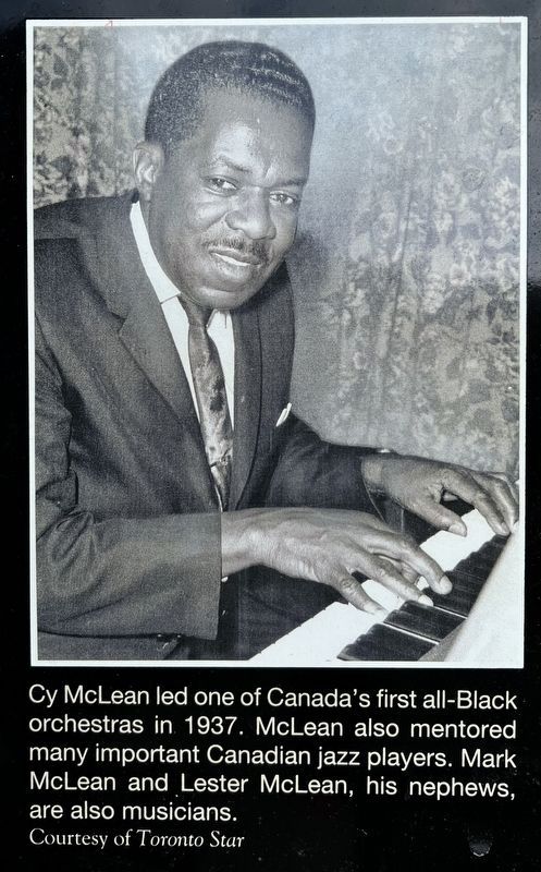 Cy McLean marker photo and caption detail (left) image. Click for full size.