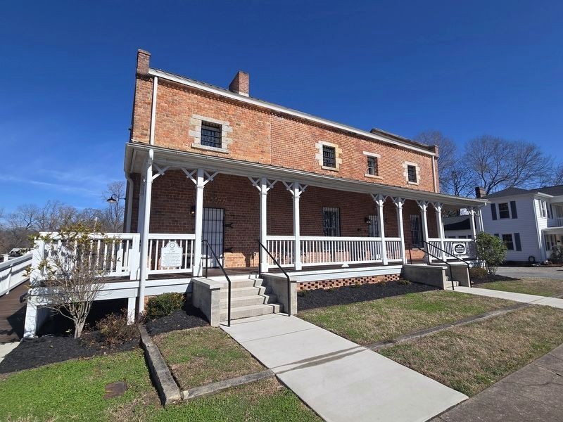 Jail - 1848 Marker now attached to porch railing. Click for full size. Jail - 1848 Marker now attached to porch railing image. Click for full size.
