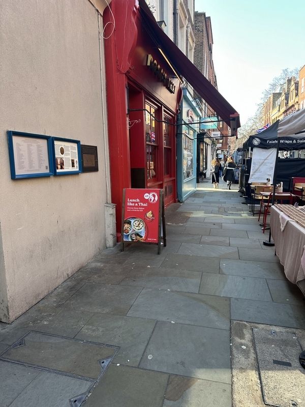 Seven Dials Marker - wide view, looking west along Earlham Street image. Click for full size.