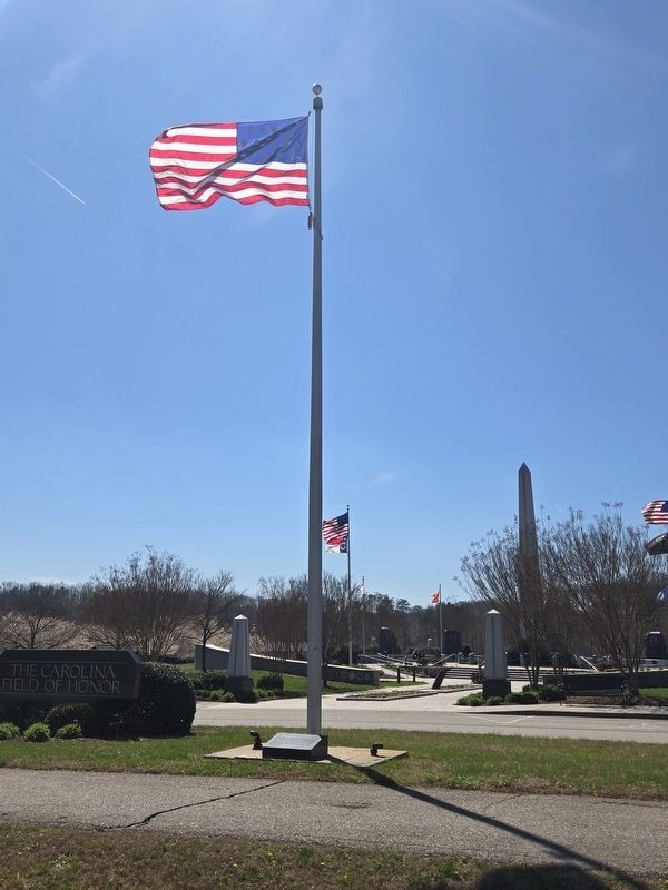 Fort Sumter Flag and Marker looking towards center obelisk at the Carolina Field of Honor image. Click for full size.