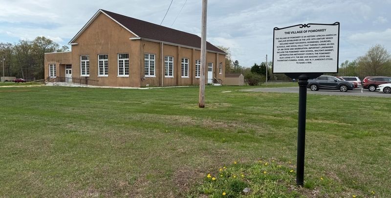 The Village of Pomonkey Marker with Pomonkey High School in the background. Click for full size. The Village of Pomonkey Marker with Pomonkey High School in the background image. Click for full size.