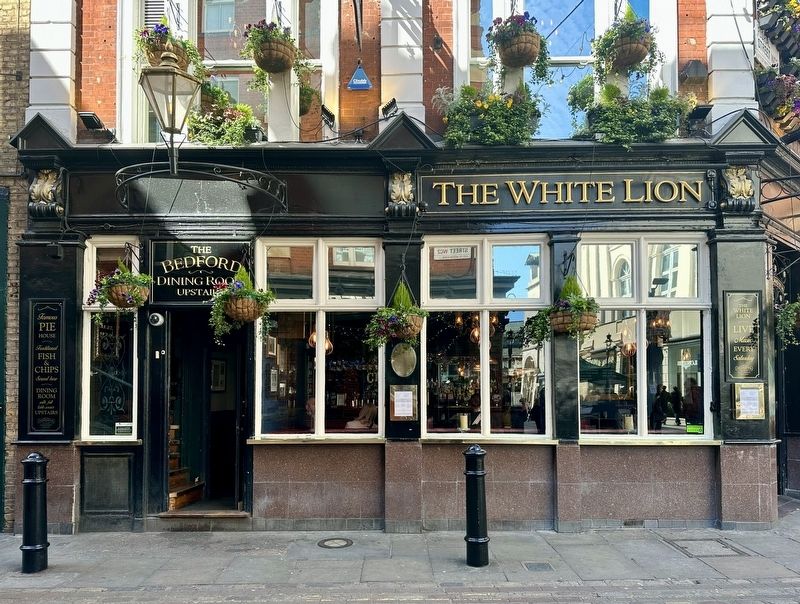 The White Lion Marker - wide view. Click for full size. The White Lion Marker - wide view image. Click for full size.