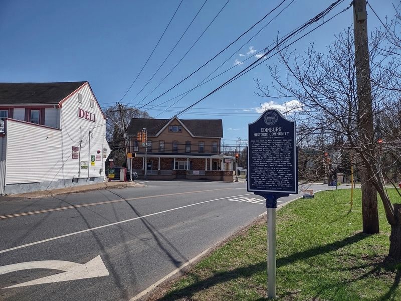 Edinburg Historic Community Marker with the former Edinburg Hotel in the background image. Click for full size.