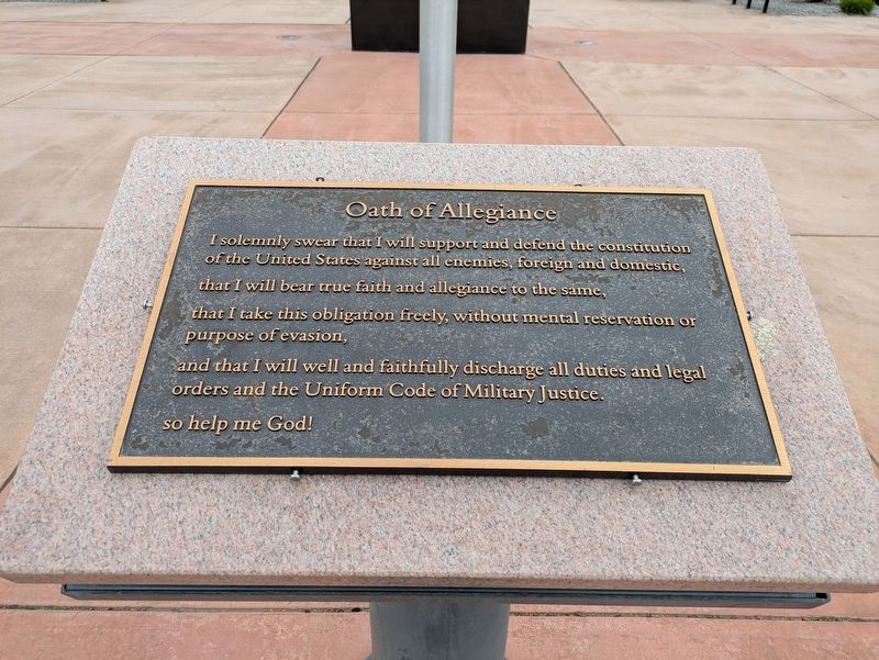 Flagpole plaque image. Click for full size.