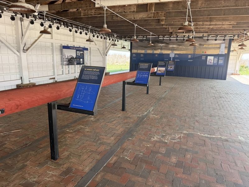 Several markers on display in the open-air shed image. Click for full size.