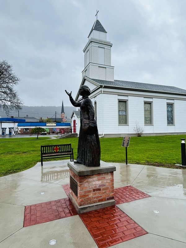 Clara Barton Marker - St. Pauls Lutheran Church In The Background. Click for full size. Clara Barton Marker - St. Pauls Lutheran Church In The Background image. Click for full size.