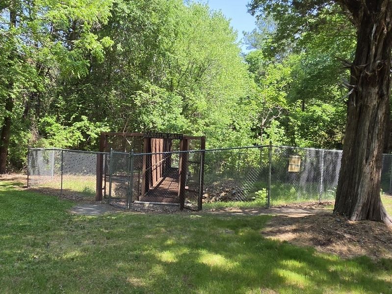 Randolph Shaft in the fence. Marker is attached to the chain link fence. Click for full size. Randolph Shaft in the fence. Marker is attached to the chain link fence image. Click for full size.