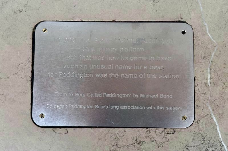 Plaque by statue: So began Paddington Bear's long association with this station� image. Click for full size.