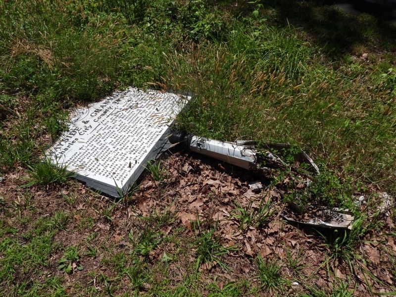 The marker in its current damaged state image. Click for full size.