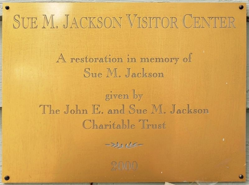 The John E. & Sue M. Jackson Visitor's Center Dedication Plaque image. Click for full size.