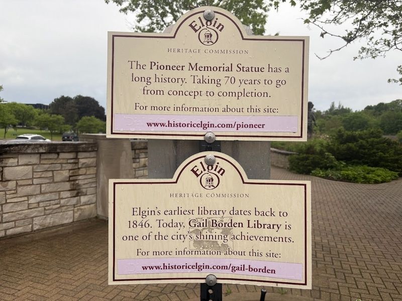 Two markers near the pioneer statue image. Click for full size.