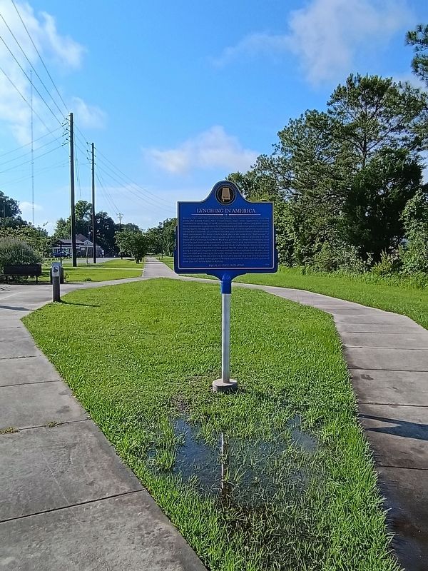 view of marker when approaching from the north on the bike trail image. Click for full size.