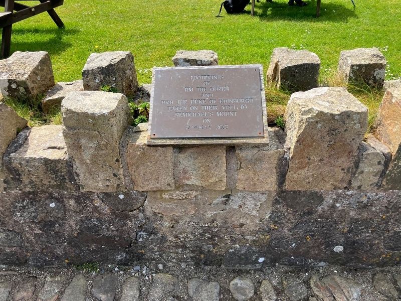Footprints of HM the Queen marker shown facing south over the green space image. Click for full size.