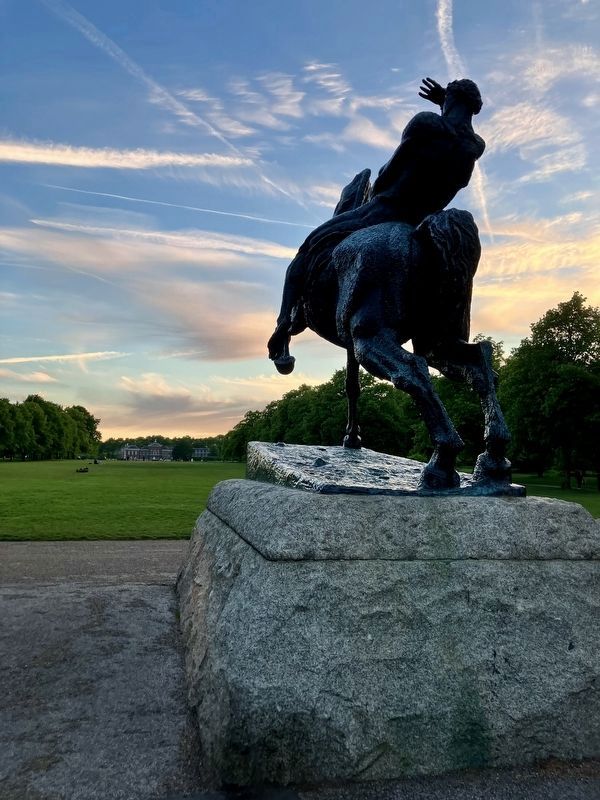 <i>Physical Energy</i> statue shown from the rear with Kensington Palace in background. Click for full size. <i>Physical Energy</i> statue shown from the rear with Kensington Palace in background image. Click for full size.