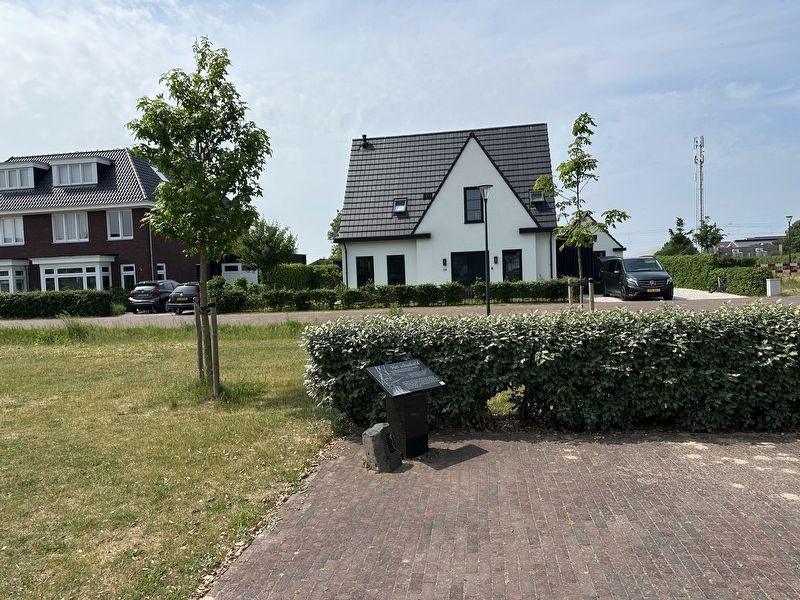 Het Schuilveld / The Sheltering Field Marker - wide view. Click for full size. Het Schuilveld / The Sheltering Field Marker - wide view image. Click for full size.
