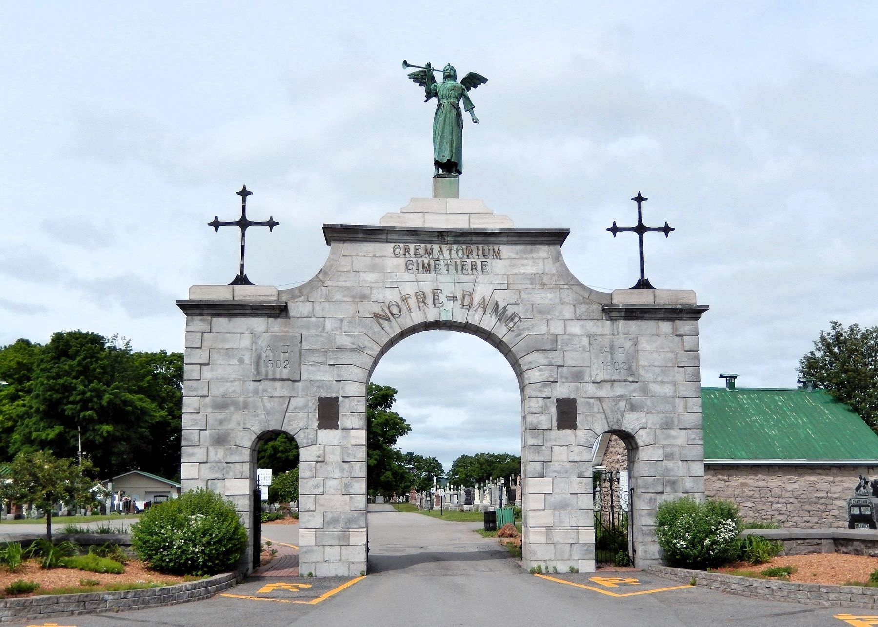 Notre-Dame Cemetery Gate - The Stone Arch. Click for full size. Notre-Dame Cemetery Gate - The Stone Arch image. Click for full size.