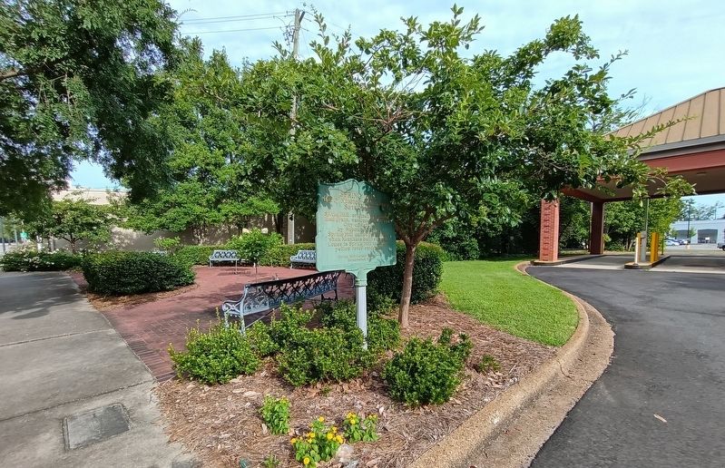 View of marker when headed west on Old Shell road and from the exit from the bank drive thru image. Click for full size.