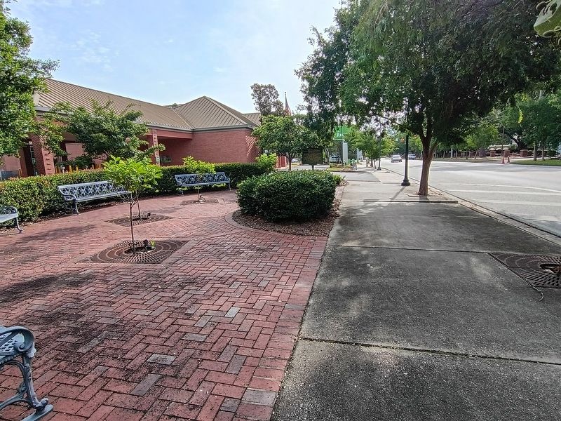 View of marker and mini park when approaching from the west on the sidewalk or Old Shell Road image. Click for full size.