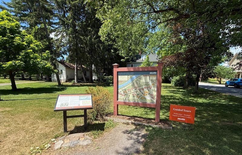 Signage in the parking lot for Historic Huguenot Street. Click for full size. Signage in the parking lot for Historic Huguenot Street image. Click for full size.
