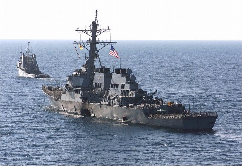 USS Cole (DDG 67) Leaving Aden, Yemen, Post-Attack. Click for full size. USS Cole (DDG 67) Leaving Aden, Yemen, Post-Attack image. Click for full size.