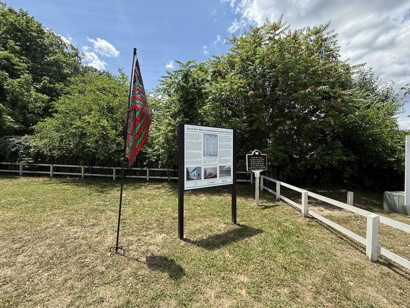 Plaques interpreting the Peter Mott House image. Click for full size.
