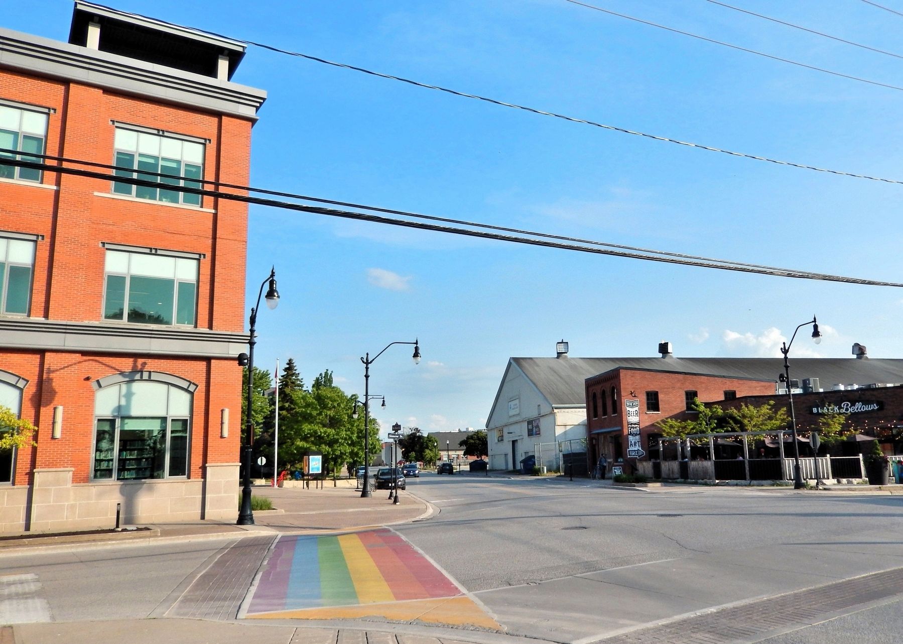 Pride Flag Crosswalk Across Simcoe Street image. Click for full size.