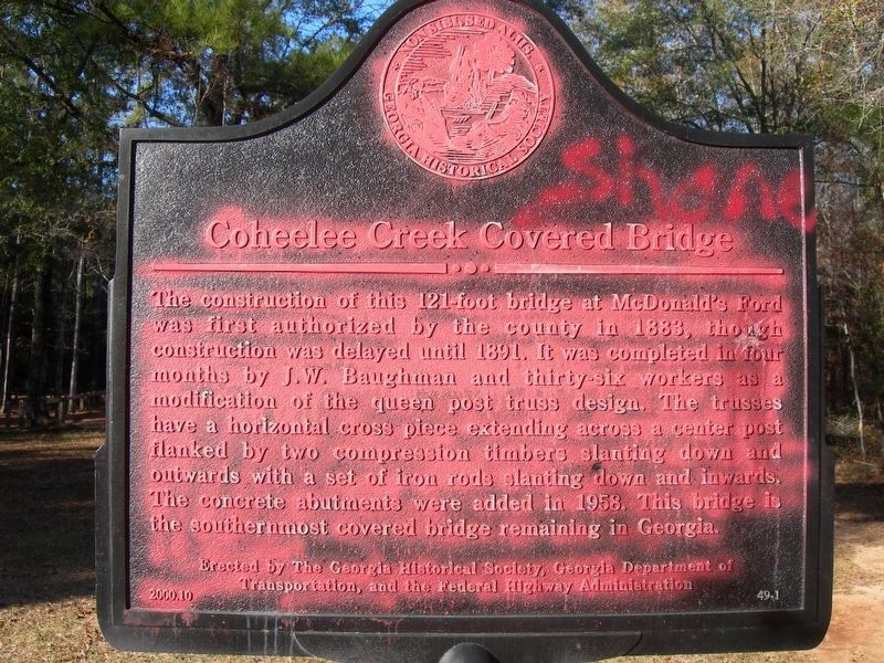 Coheelee Creek Covered Bridge Marker Defaced. Click for full size. Coheelee Creek Covered Bridge Marker Defaced image. Click for full size.