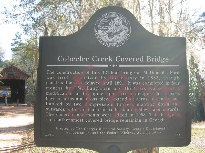 Coheelee Creek Covered Bridge Marker Defaced. Click for full size. Coheelee Creek Covered Bridge Marker Defaced image. Click for full size.