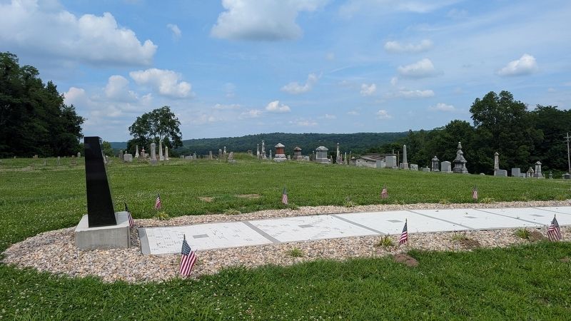 Laurel Veterans Memorial with Conwell Cemetery. Click for full size. Laurel Veterans Memorial with Conwell Cemetery image. Click for full size.