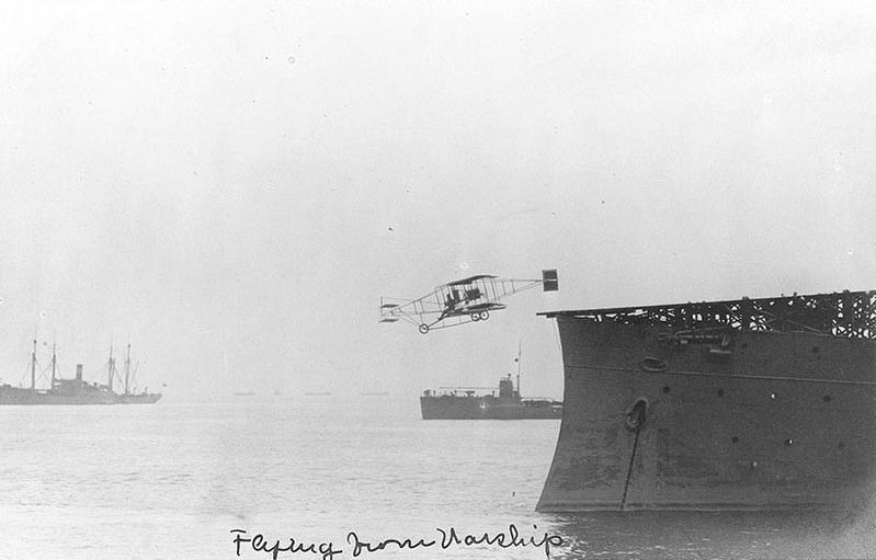 Eugene Ely flying from USS Birmingham off Fort Monroe. Click for full size. Eugene Ely flying from USS Birmingham off Fort Monroe image. Click for full size.