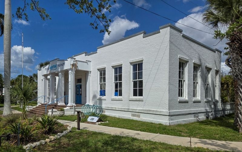 A Century of Community marker (center left, mounted low) and the Florida Maritime Museum. Click for full size. A Century of Community marker (center left, mounted low) and the Florida Maritime Museum image. Click for full size.