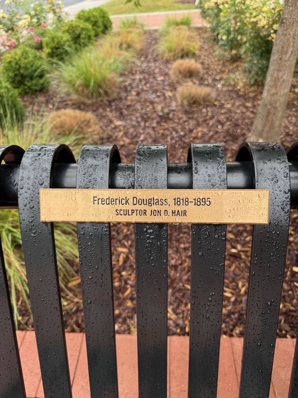 Frederick Douglass bench plaque image. Click for full size.