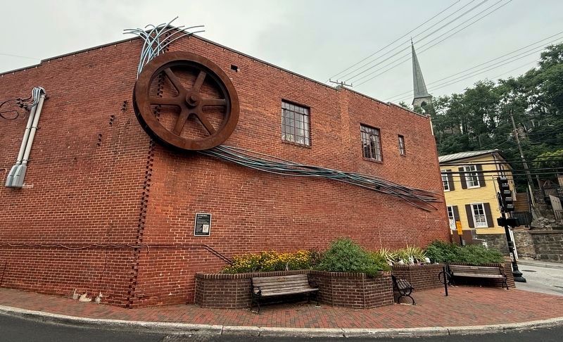 Waterwheel Marker and sculpture image. Click for full size.