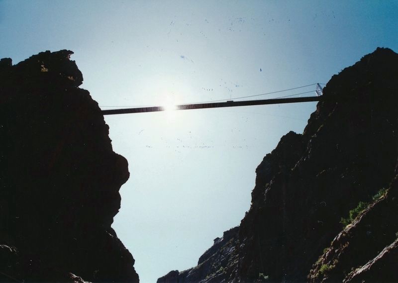 Royal Gorge bridge, view from underneath, standing next to Arkansas River. Click for full size. Royal Gorge bridge, view from underneath, standing next to Arkansas River image. Click for full size.