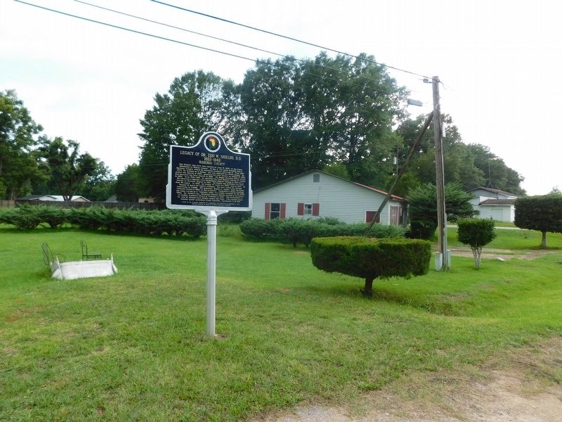 Legacy of Dr. Edd W. Shields D.D. Marker and house image. Click for full size.
