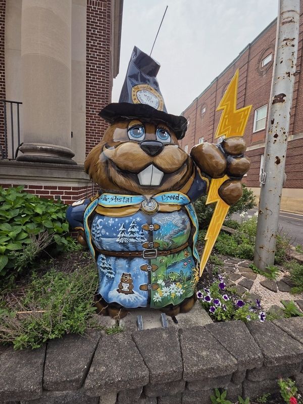 One of the groundhog statues noted on the marker at the Weather Discovery Center. Click for full size. One of the groundhog statues noted on the marker at the Weather Discovery Center image. Click for full size.