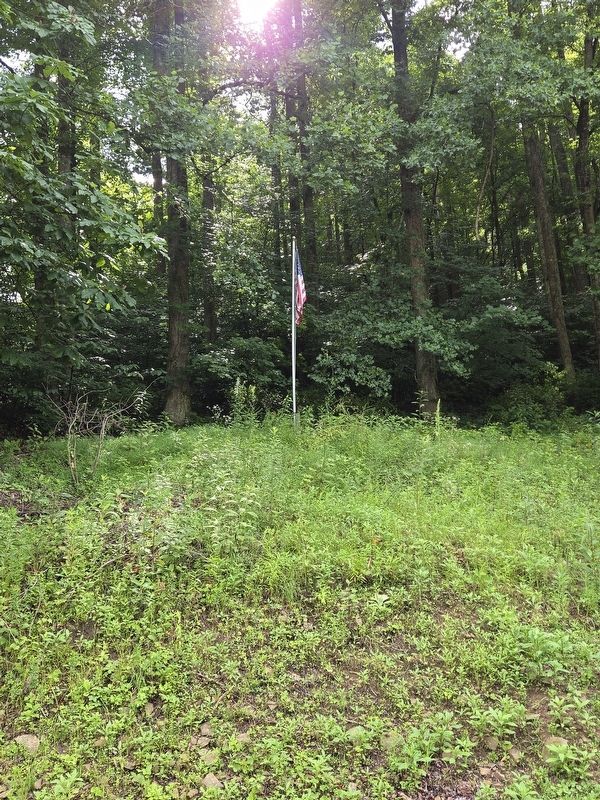 Flagpole above the museum that is the purported spot of the Hatfield Family Well. Click for full size. Flagpole above the museum that is the purported spot of the Hatfield Family Well image. Click for full size.