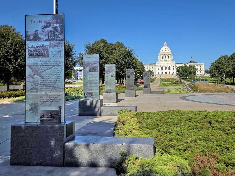 The Cost of War Marker (rear) on the west side of the Minnesota World War II Memorial image. Click for full size.