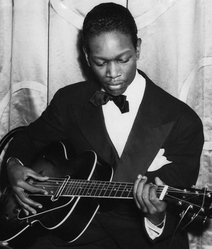 Charlie Christian performing at the Waldorf Astoria, New York. Click for full size. Charlie Christian performing at the Waldorf Astoria, New York image. Click for full size.
